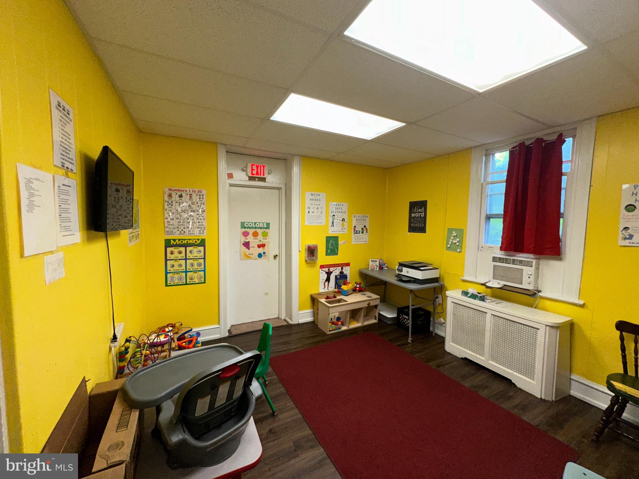 223 East Park Road Havertown, PA 19083 - Photo 32 of 37 a living room with furniture and a flat screen tv