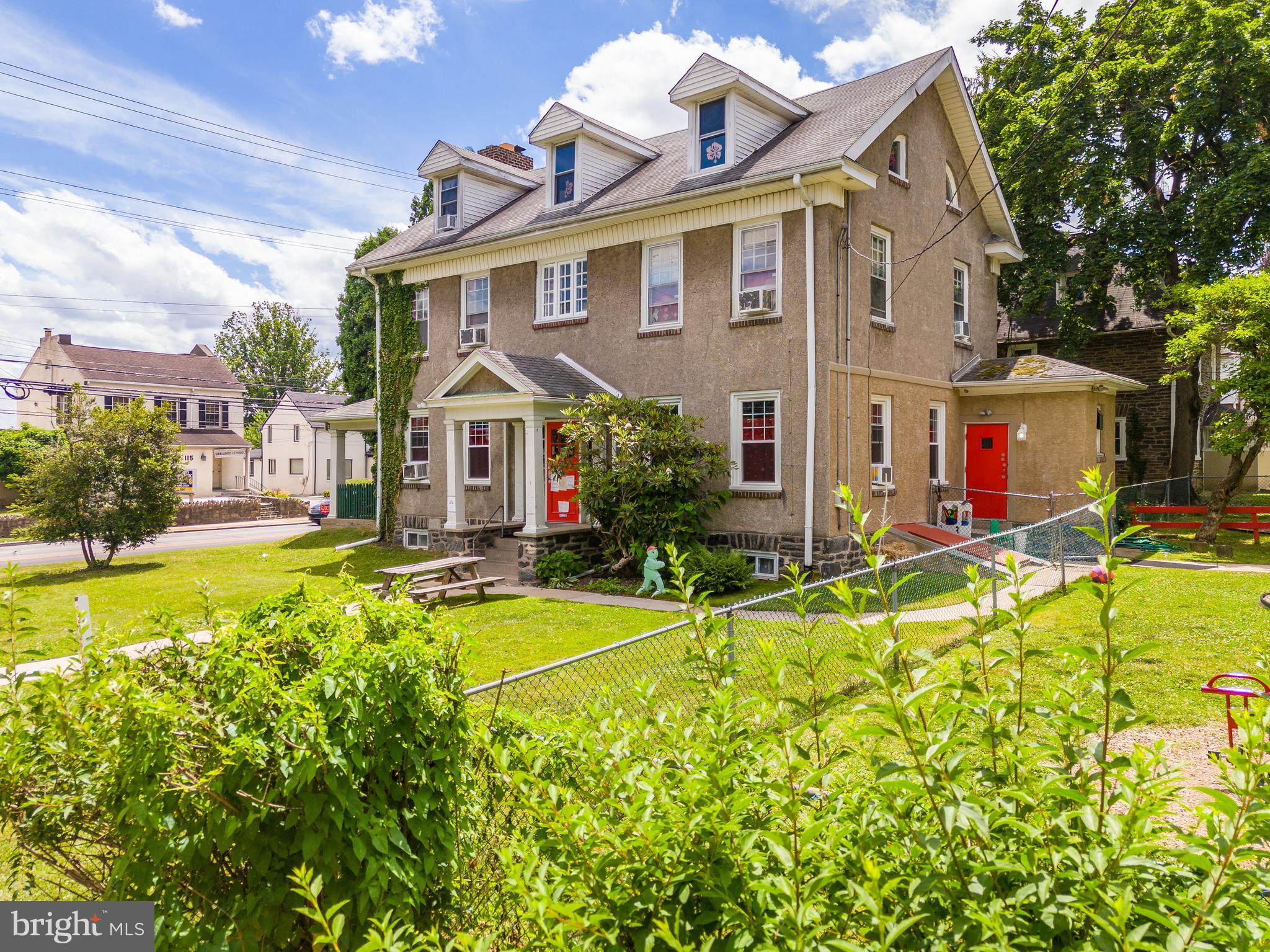 223 East Park Road Havertown, PA 19083 - Photo 5 of 37 a front view of house with yard and swimming pool