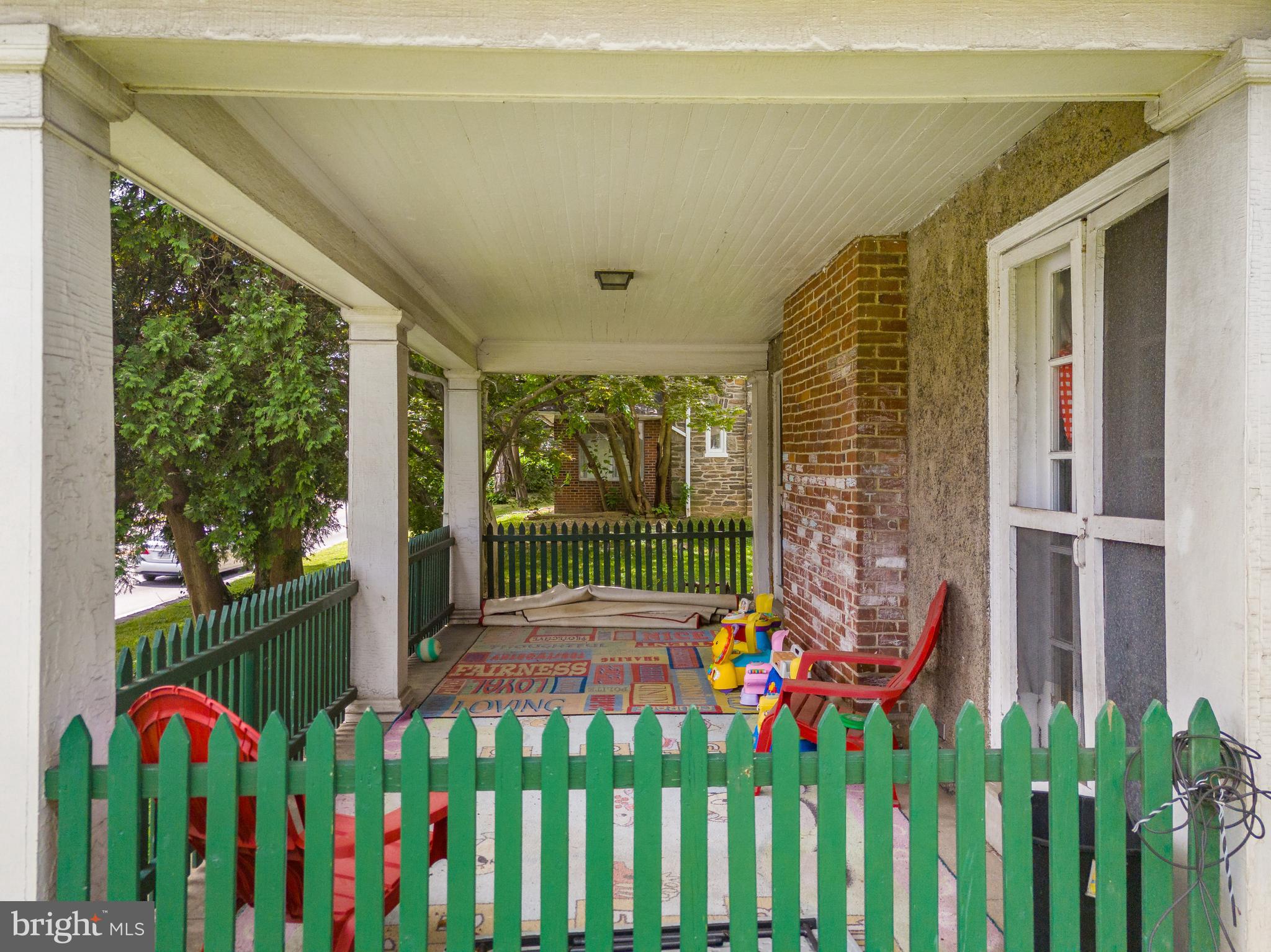 223 East Park Road Havertown, PA 19083 - Photo 9 of 37 a flower garden is sitting in front of a house
