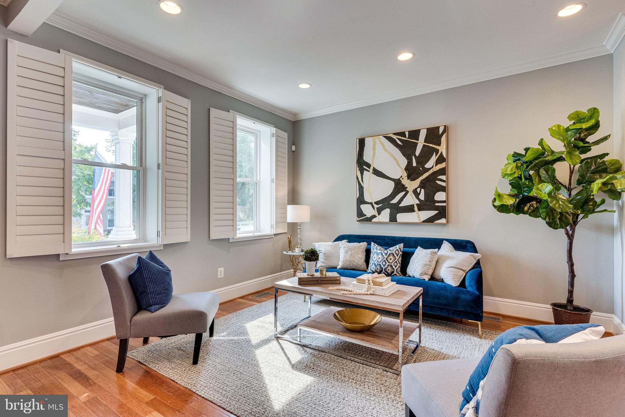 1026 7th Street Northeast Washington, DC 20002 - Photo 11 of 70 Bright & open living room with plantation shutters