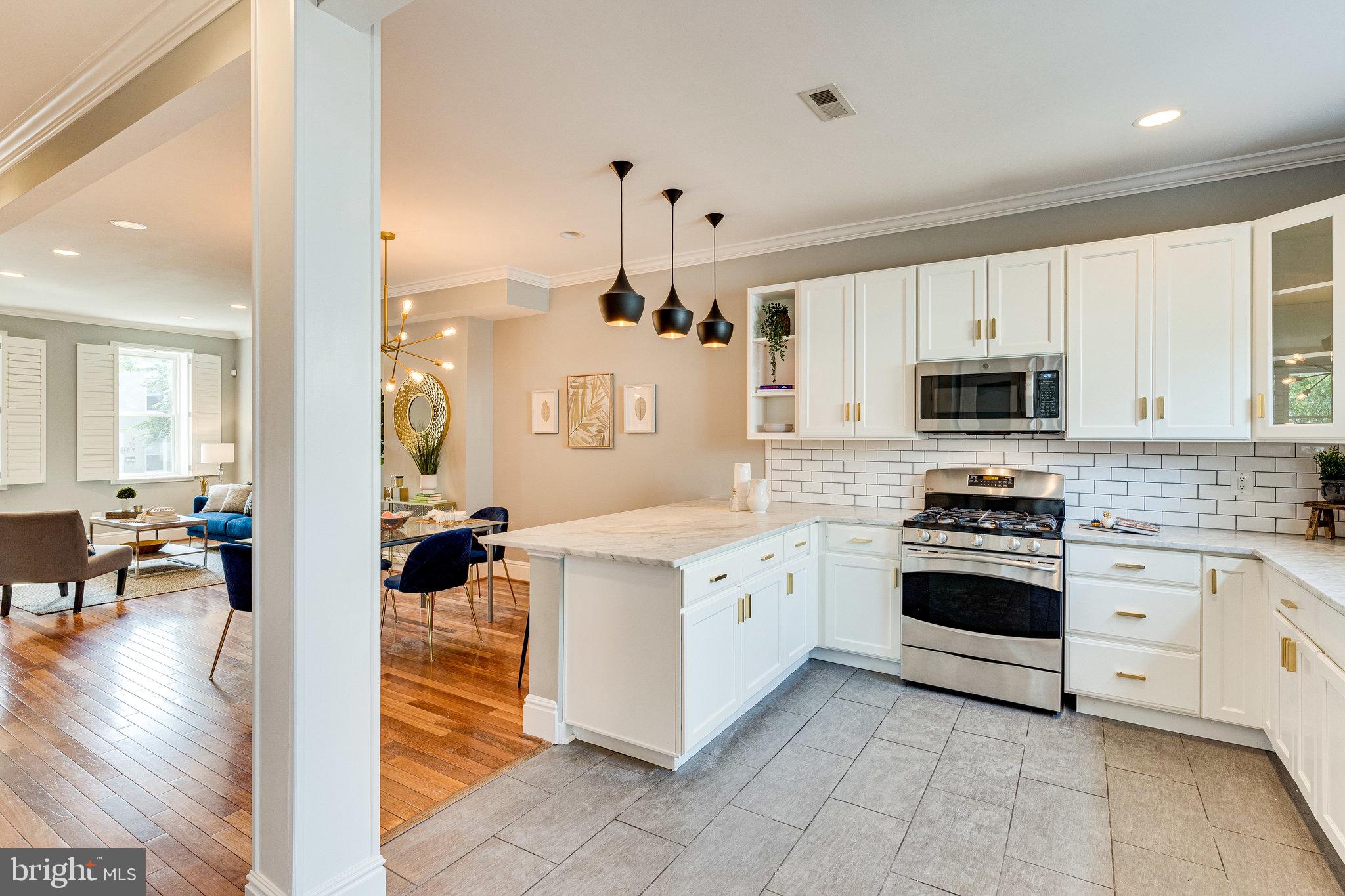 1026 7th Street Northeast Washington, DC 20002 - Photo 21 of 70 Gourmet kitchen overlooking dining/living area