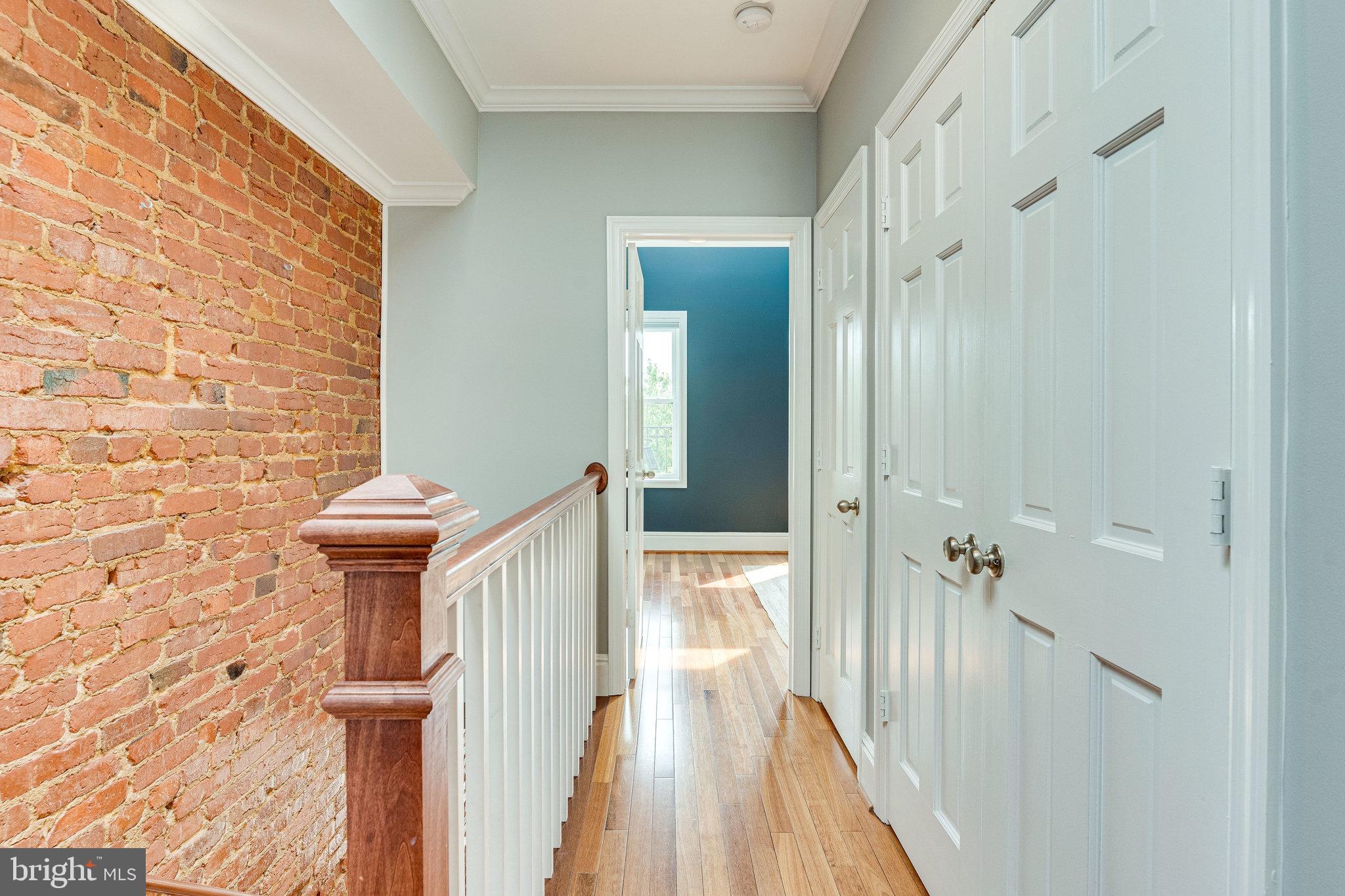 1026 7th Street Northeast Washington, DC 20002 - Photo 46 of 70 2nd level hallway with skylight and custom railing