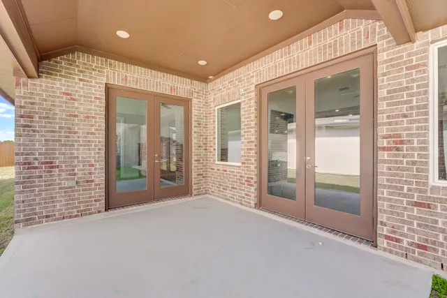 a view of porch with a yard