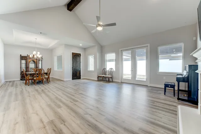 a view of a living room and dining room