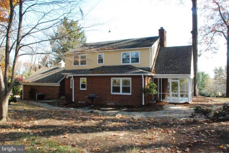 15500 Tierra Drive Silver Spring, MD 20906 - Photo 11 of 21 a front view of a house with garden