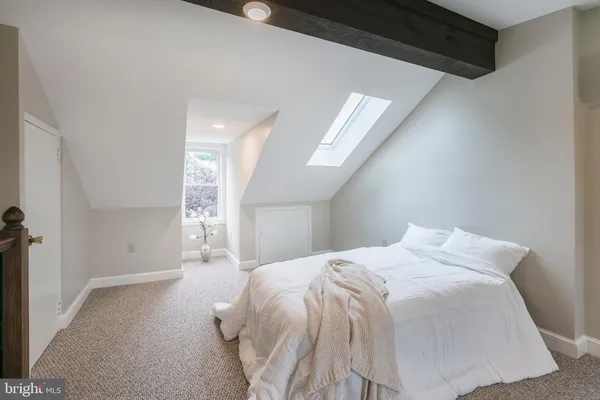 a view of livingroom with furniture and windows