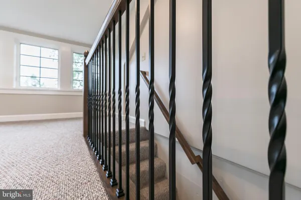 a view of a hallway with a window