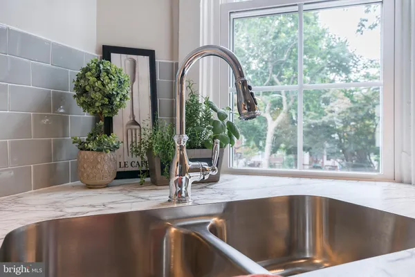 a close view of sink and a window