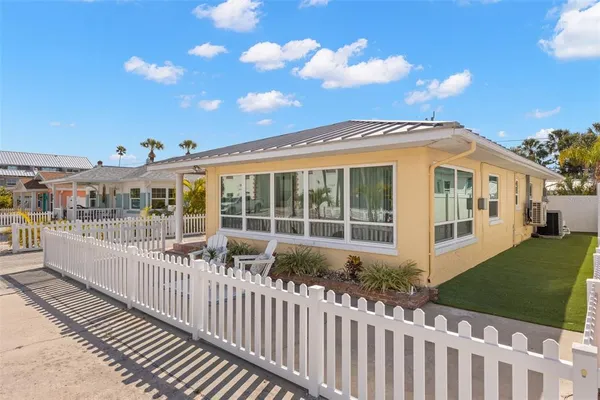 a view of a house with a roof deck