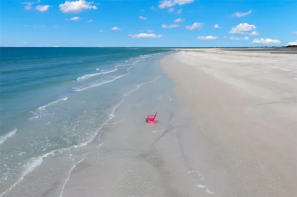 a view of beach and an entryway