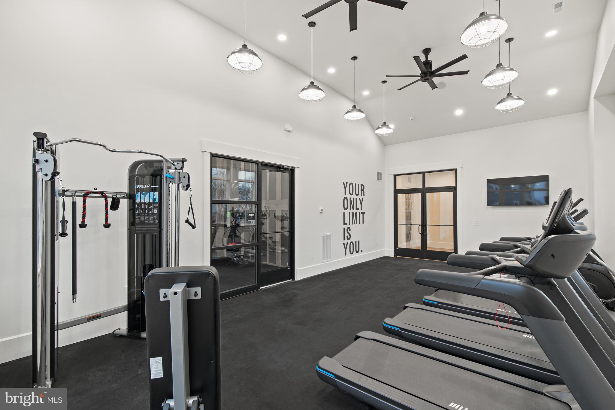 2320 Hadley Boulevard, Unit 101 Enola, PA 17025 - Photo 24 of 31 a spacious bedroom with a bed a ceiling fan and a rug
