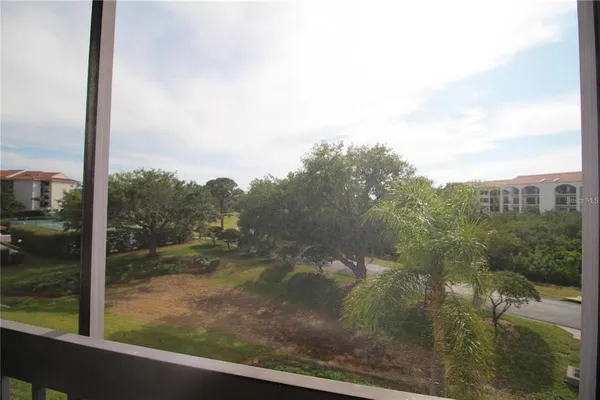a kitchen with a sink appliances and cabinets
