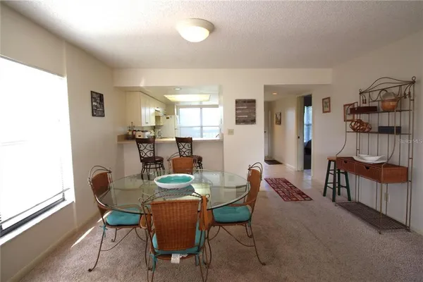 a kitchen with a stove top oven sink and cabinets