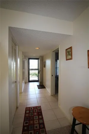 a kitchen with a stove a sink and a refrigerator