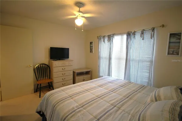 a view of parking garage with cars