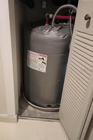 a view of a patio with a table chairs and a patio