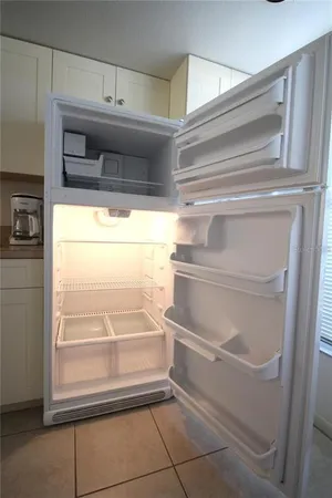 a aerial view of a house with a yard