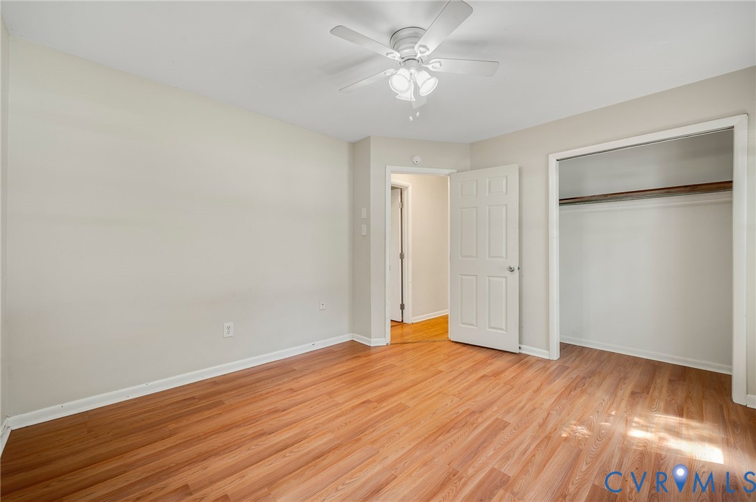 3530 Glisson Road Richmond, VA 23237 - Photo 13 of 17 Wood-finish flooring throughout, white ceiling fan