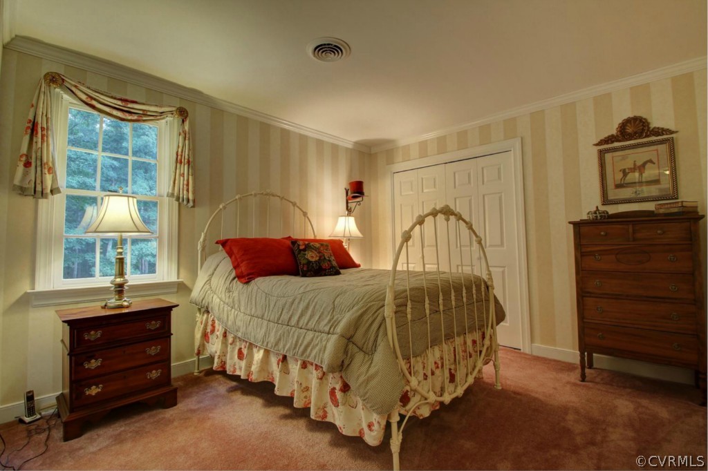 14101 Grangewood Road Midlothian, VA 23113 - Photo 12 of 17 a bedroom with a bed and a window