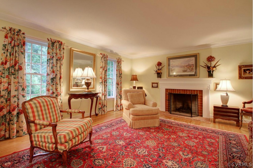 14101 Grangewood Road Midlothian, VA 23113 - Photo 3 of 17 a living room with furniture and a fireplace