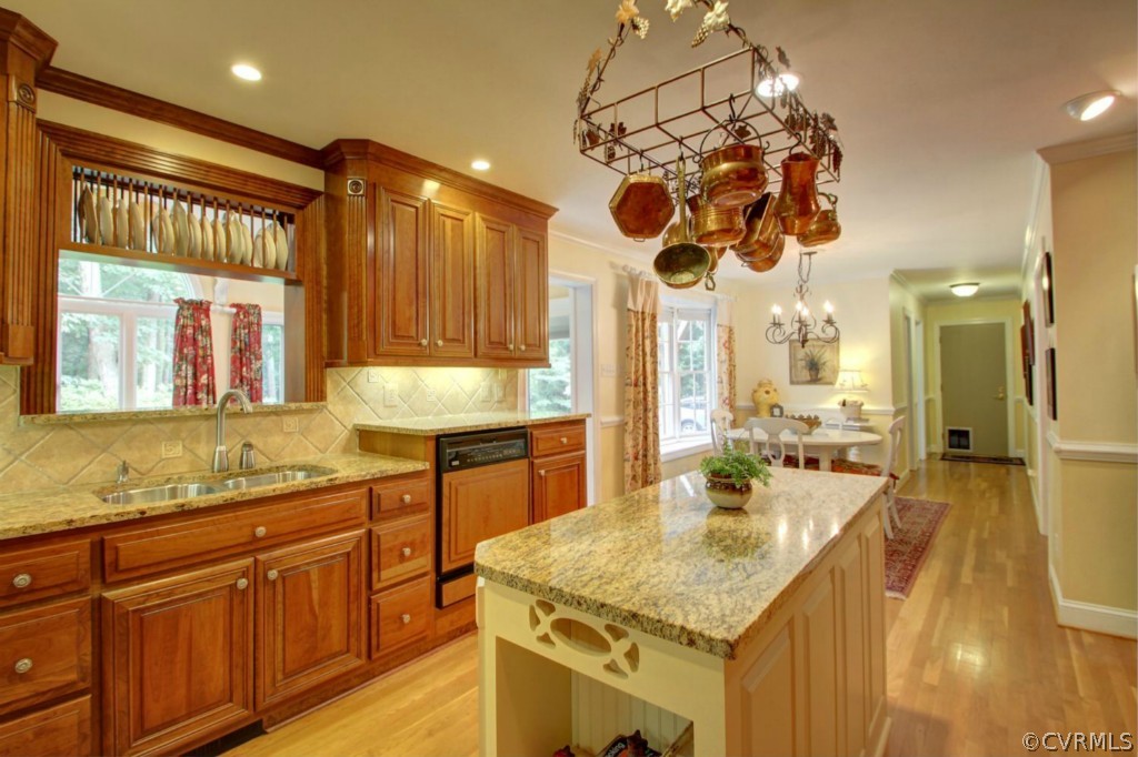 14101 Grangewood Road Midlothian, VA 23113 - Photo 6 of 17 a kitchen with stainless steel appliances granite countertop a sink a stove and a wooden floors