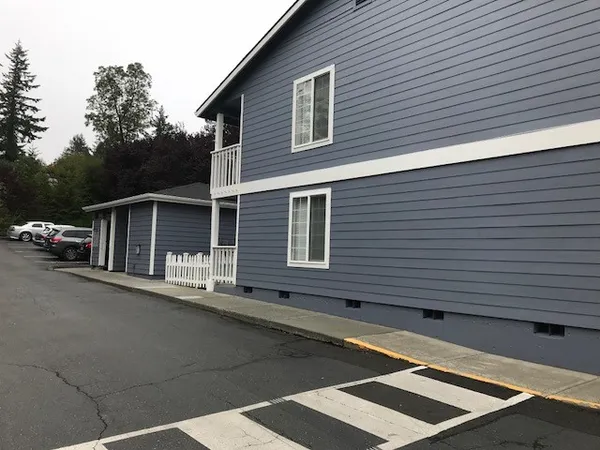 a view of a house with a street
