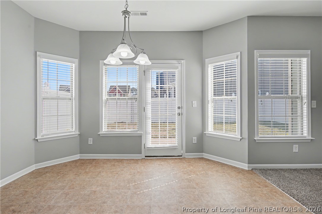 61 Bicentennial Way Cameron, NC 28326 - Photo 14 of 49 a view of an empty room with a window