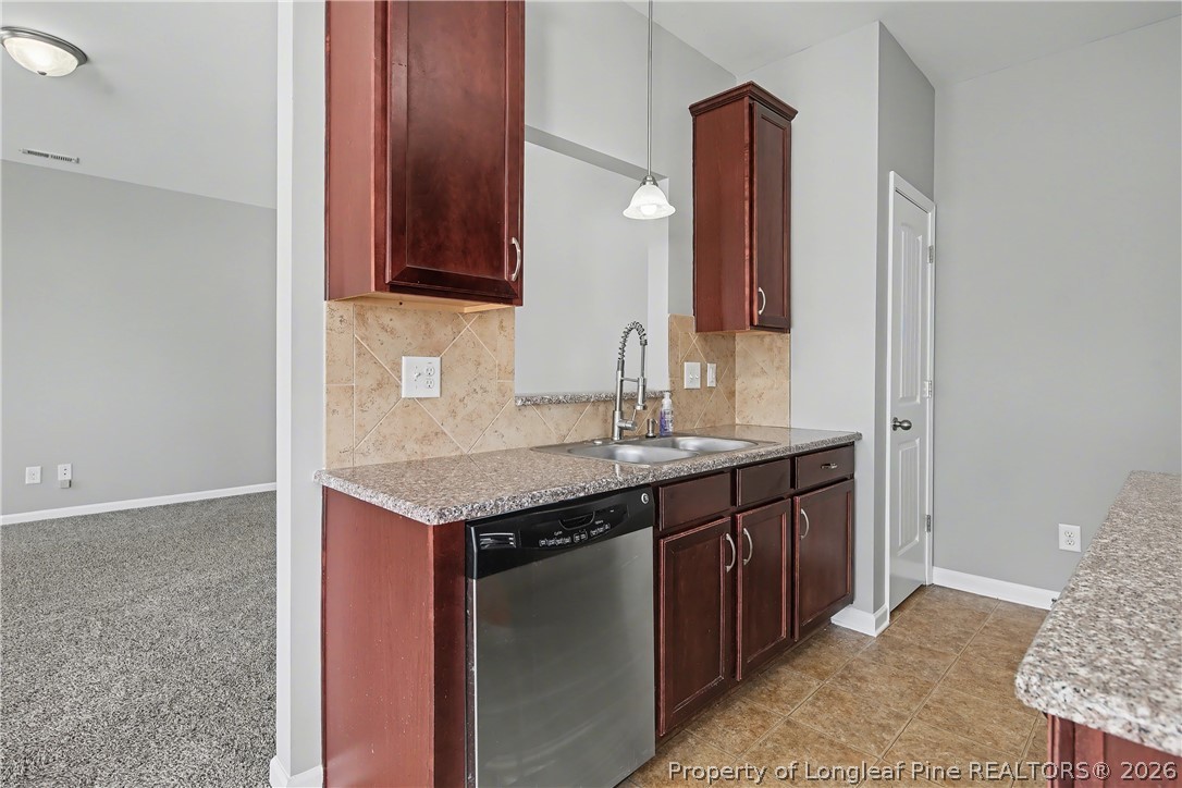 61 Bicentennial Way Cameron, NC 28326 - Photo 20 of 49 a bathroom with a granite countertop sink and a mirror