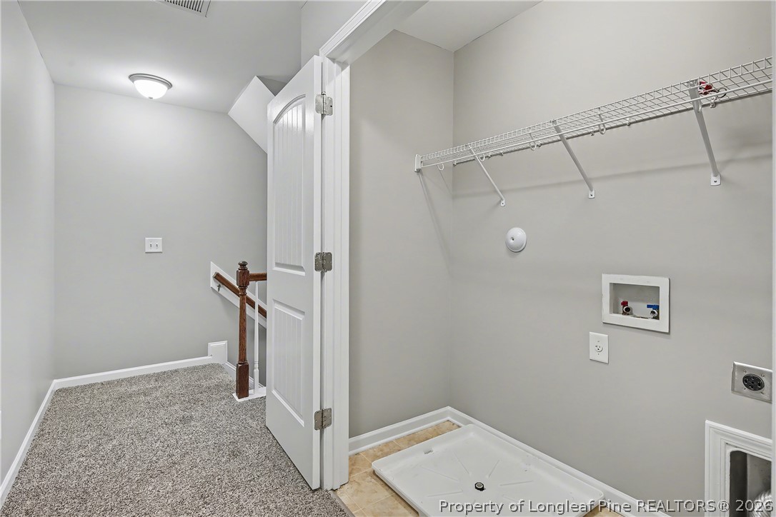 61 Bicentennial Way Cameron, NC 28326 - Photo 34 of 49 a bathroom with a sink and shower