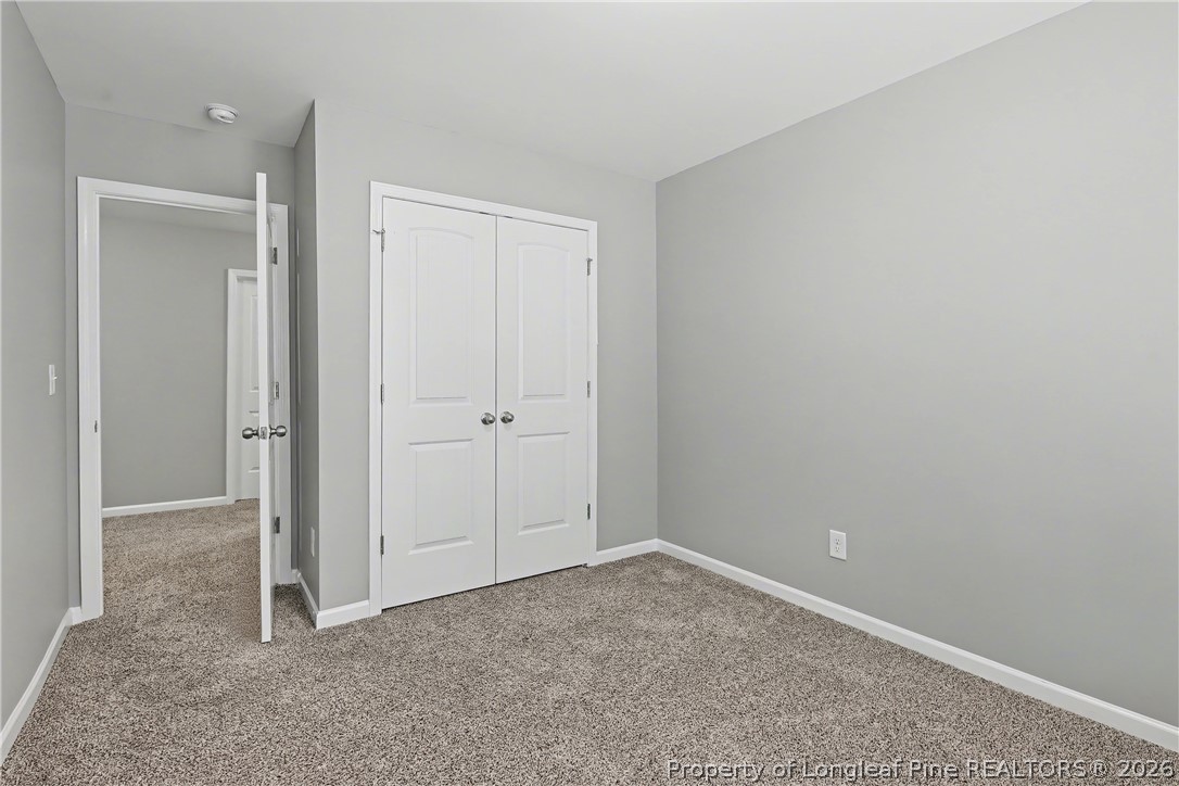 61 Bicentennial Way Cameron, NC 28326 - Photo 38 of 49 an empty room with closet area
