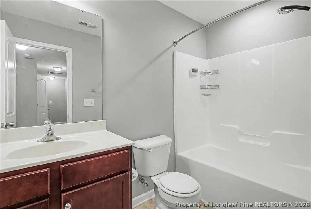 61 Bicentennial Way Cameron, NC 28326 - Photo 39 of 49 a bathroom with a sink a toilet and shower