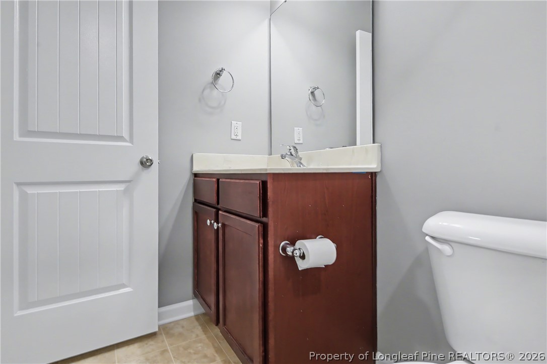 61 Bicentennial Way Cameron, NC 28326 - Photo 40 of 49 a bathroom with a sink and mirror