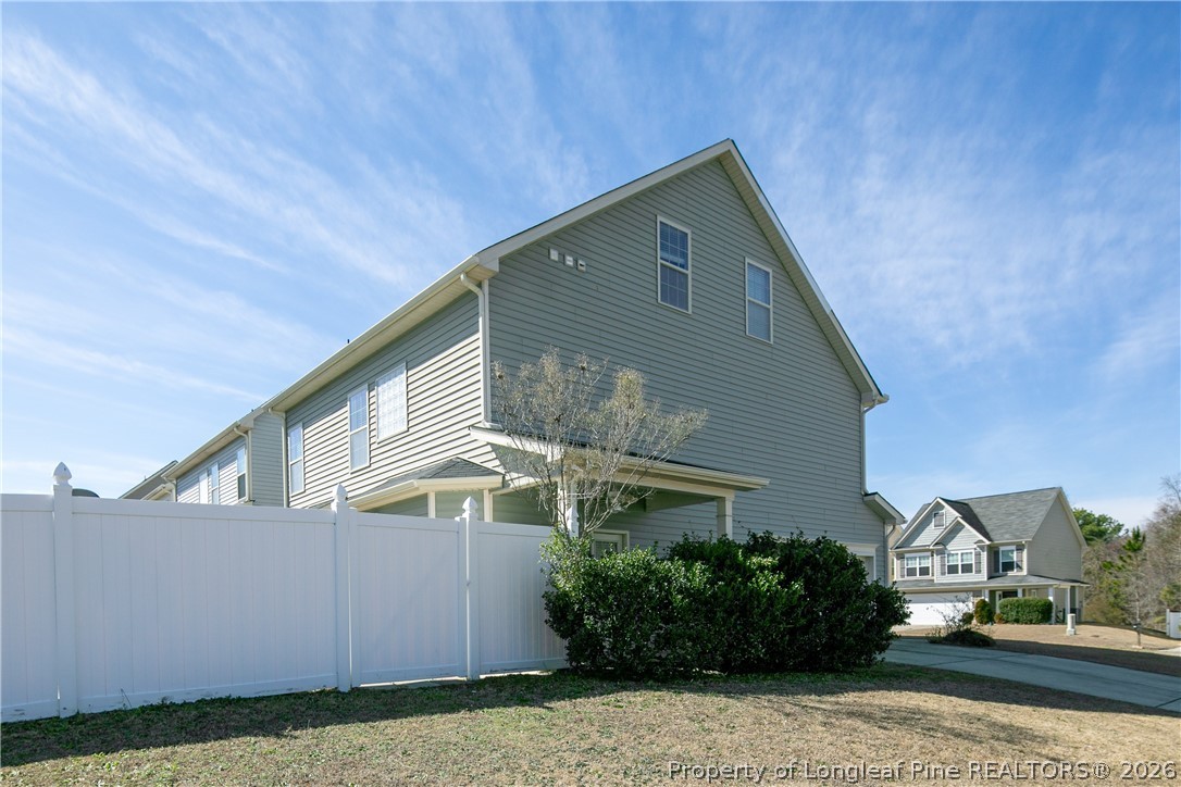 61 Bicentennial Way Cameron, NC 28326 - Photo 48 of 49 a front view of a house with garden