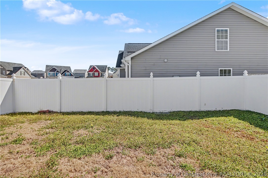 61 Bicentennial Way Cameron, NC 28326 - Photo 49 of 49 a view of a house with a yard
