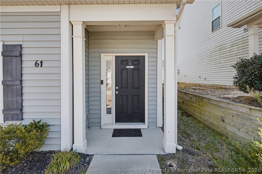 61 Bicentennial Way Cameron, NC 28326 - Photo 5 of 49 a view of a entryway door of the house