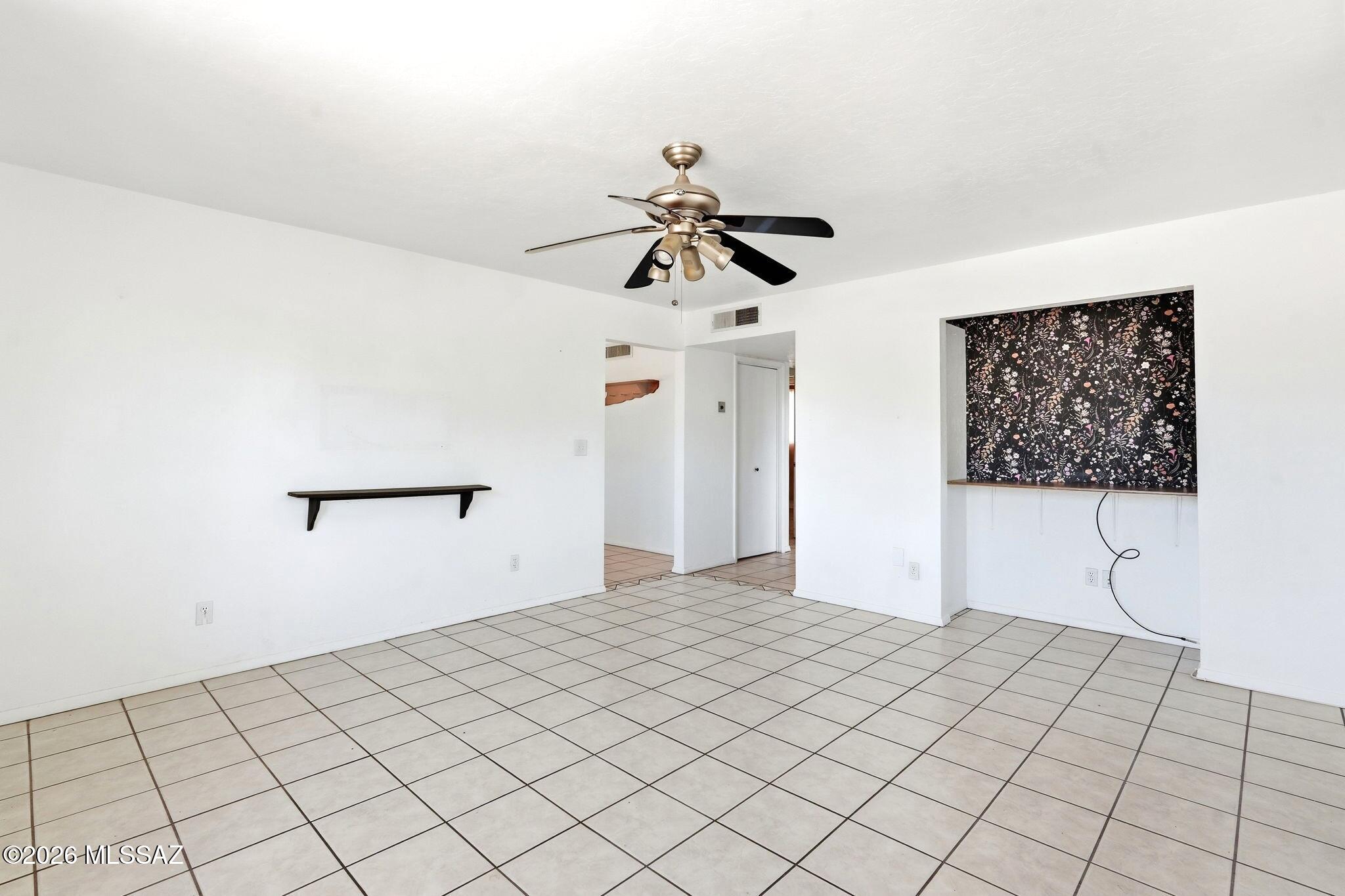5125 South Missiondale Road Tucson, AZ 85706 - Photo 5 of 32 a view of a room with closet area