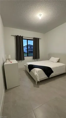 a view of a livingroom with a flat screen tv