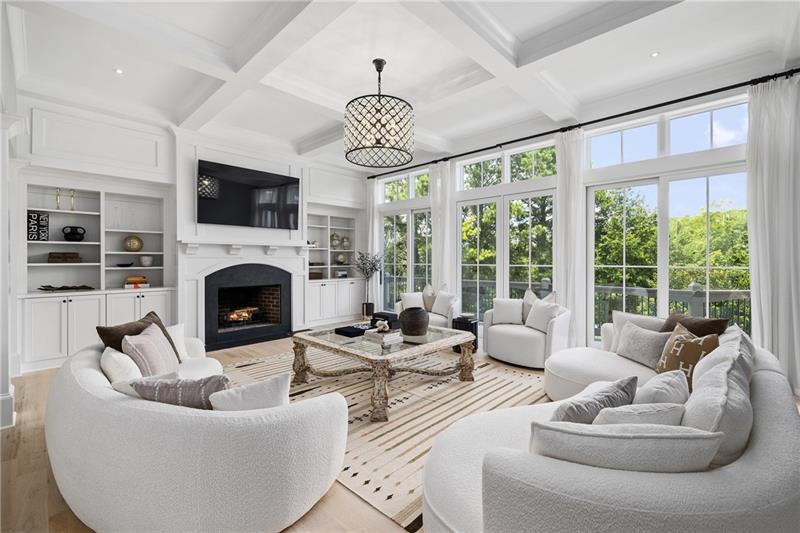 13980 Haystack Lane Milton, GA 30004 - Photo 11 of 83 a living room with furniture a fireplace and a flat screen tv