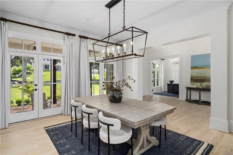 13980 Haystack Lane Milton, GA 30004 - Photo 23 of 83 a view of a dining room with furniture window and wooden floor