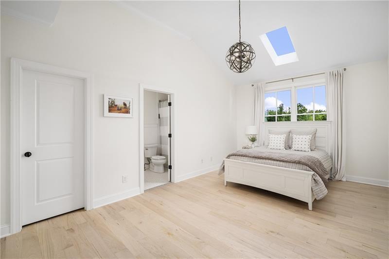 13980 Haystack Lane Milton, GA 30004 - Photo 37 of 83 a spacious bedroom with a bed and a window