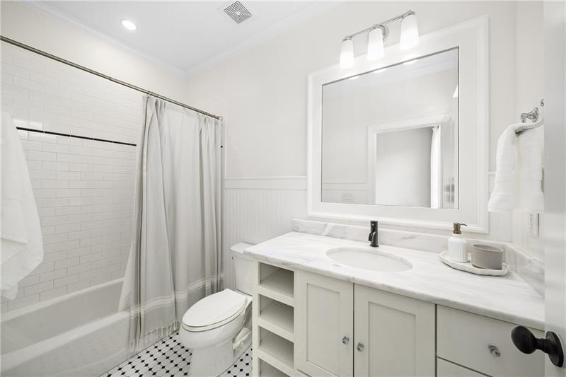13980 Haystack Lane Milton, GA 30004 - Photo 40 of 83 a bathroom with a sink toilet and shower