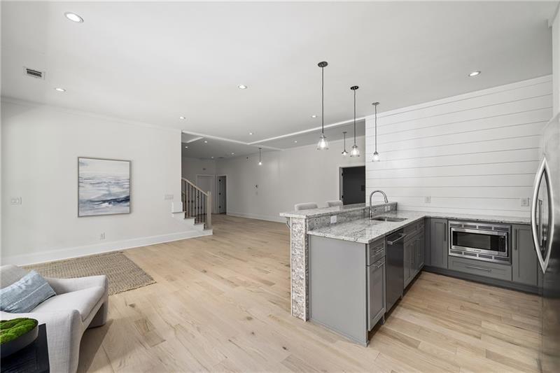 13980 Haystack Lane Milton, GA 30004 - Photo 48 of 83 a kitchen with a stove and a wooden floor