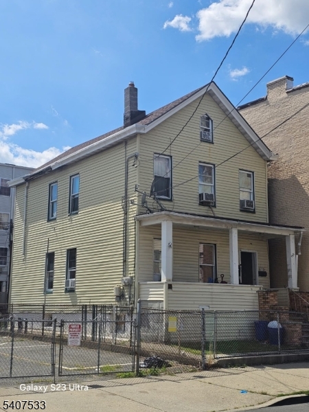 a front view of a house with garage