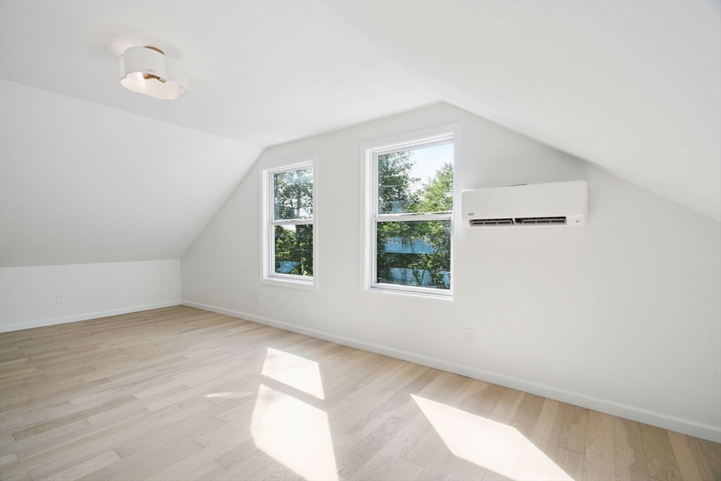 18 Chestnut Hill Road Millville, MA 01529 - Photo 15 of 26 an empty room with windows