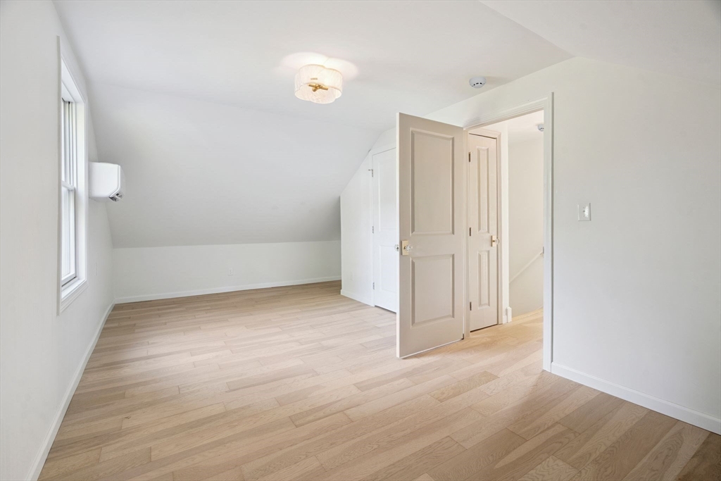 18 Chestnut Hill Road Millville, MA 01529 - Photo 17 of 26 an empty room with a natural light