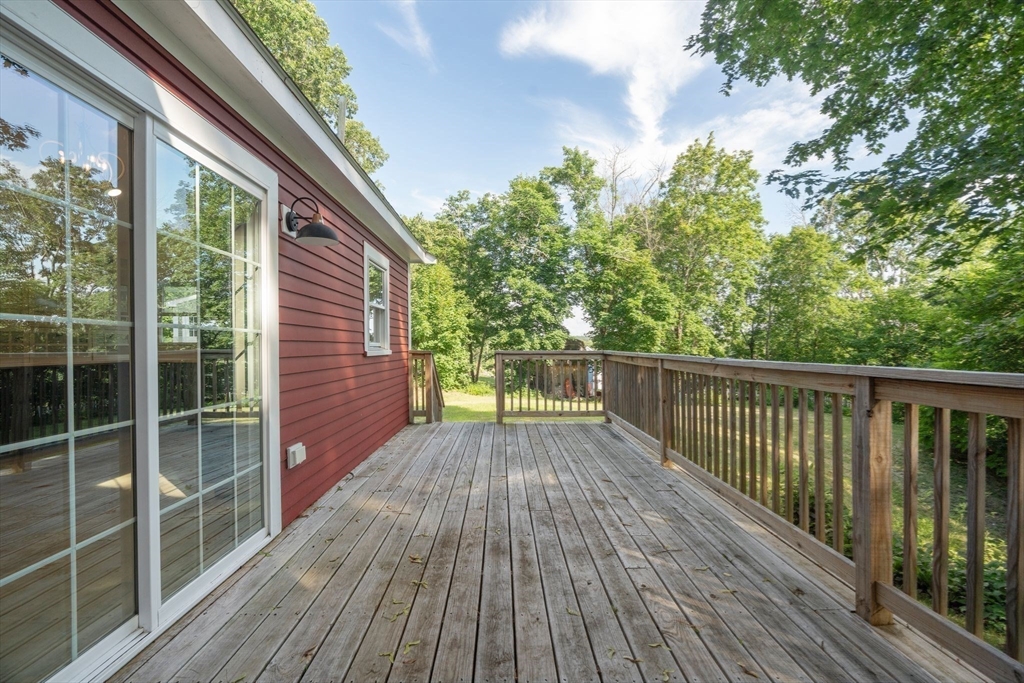 18 Chestnut Hill Road Millville, MA 01529 - Photo 21 of 26 a view of balcony with wooden floor