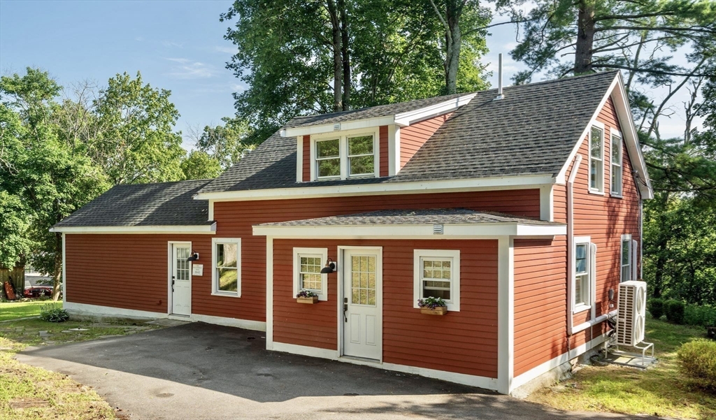 18 Chestnut Hill Road Millville, MA 01529 - Photo 25 of 26 a view of a house with a door and wooden floor