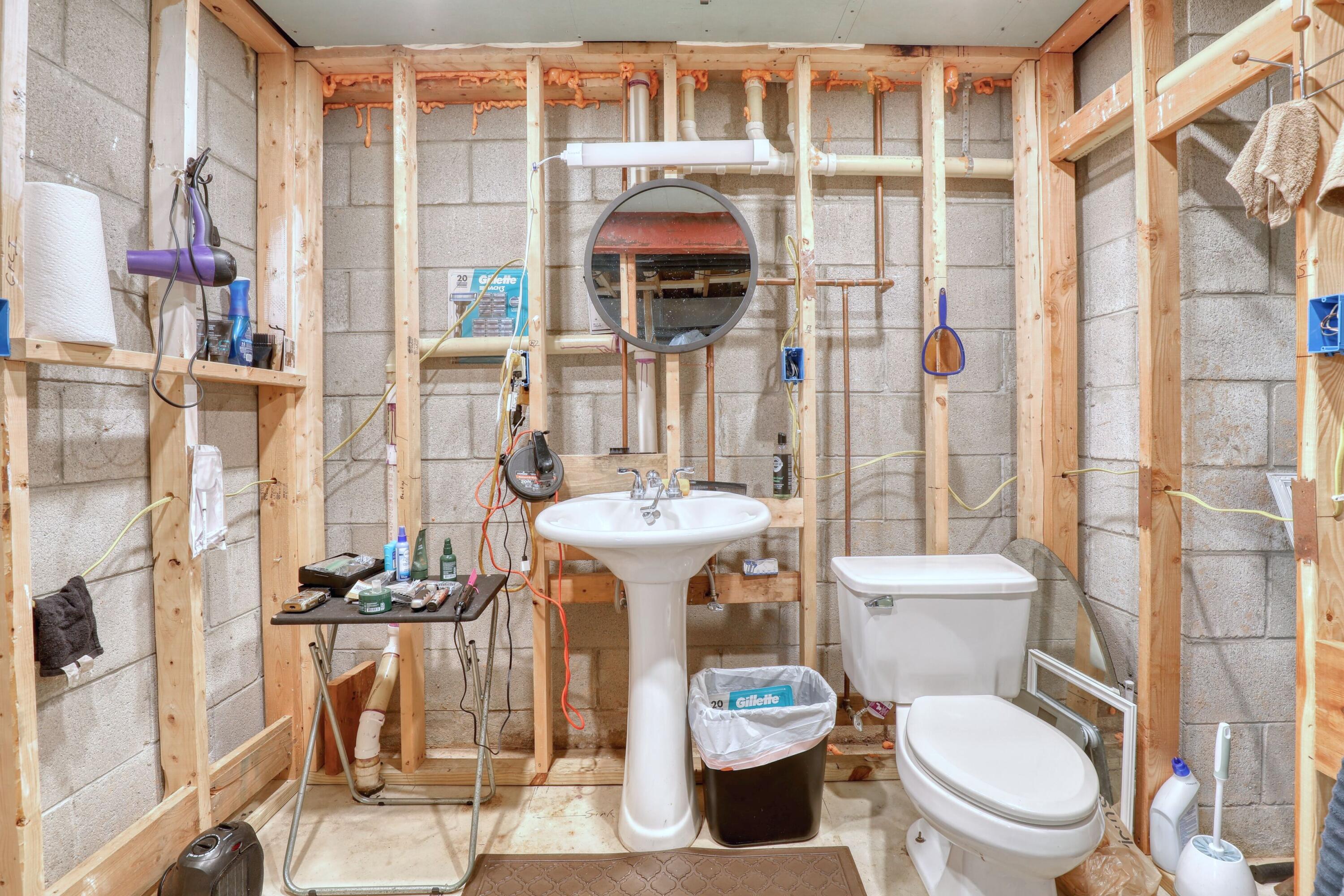3700 North Calhoun Road Brookfield, WI 53005 - Photo 33 of 42 Already Framed with Sink and Toilet! Also a Place for a Shower. Bring Your Basement Finishing Ideas!