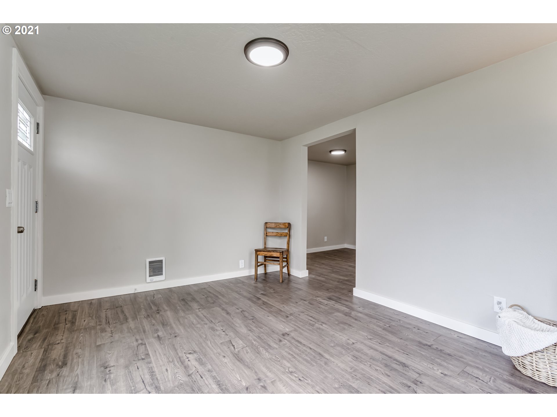 215 39th Street Springfield, OR 97478 - Photo 8 of 27 a view of an empty room with wooden floor