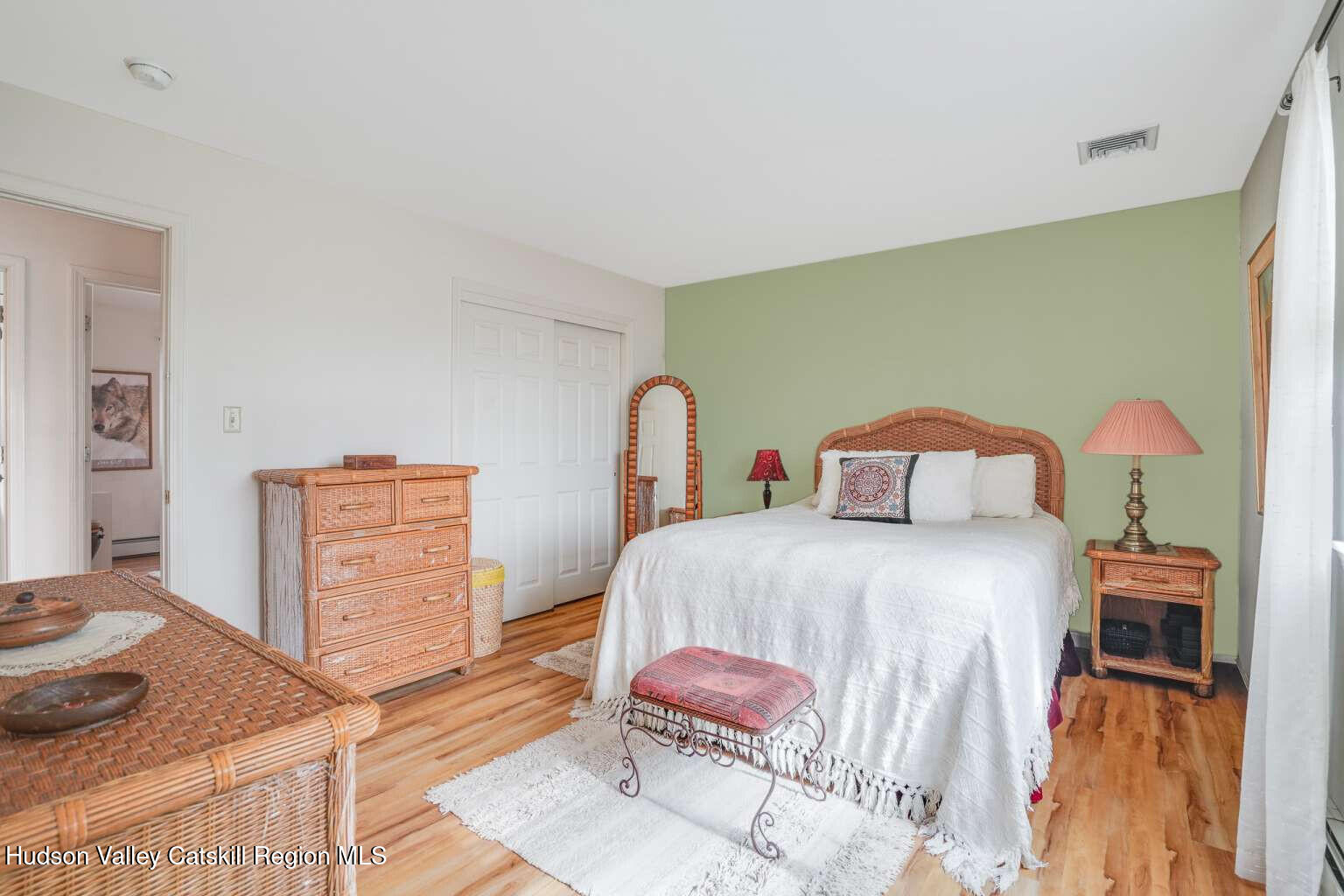 257 Bruynswick Road New Paltz, NY 12561 - Photo 11 of 23 a bedroom with a bed and a dresser